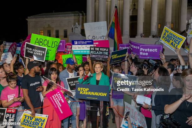 Senator Elizabeth Warren speaks to protesters in front of the U.S. Supreme Court on July 9, 2018 in Washington, DC. President Donald Trump is set to...