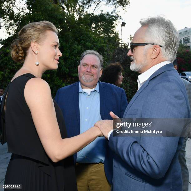 Yvonne Strahovski, Bruce Miller and Bradley Whitford attend "The Handmaid's Tale" Hulu finale at The Wilshire Ebell Theatre on July 9, 2018 in Los...