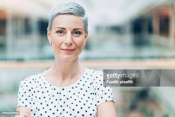 headshot of a modern businesswoman - short hair stock pictures, royalty-free photos & images