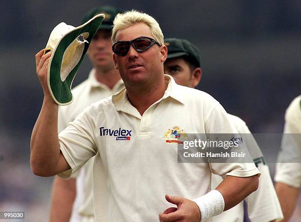 Shane Warne of Australia acknowledges the crowd after his seven first innings wickets, during day four of the Fifth Test between England and...