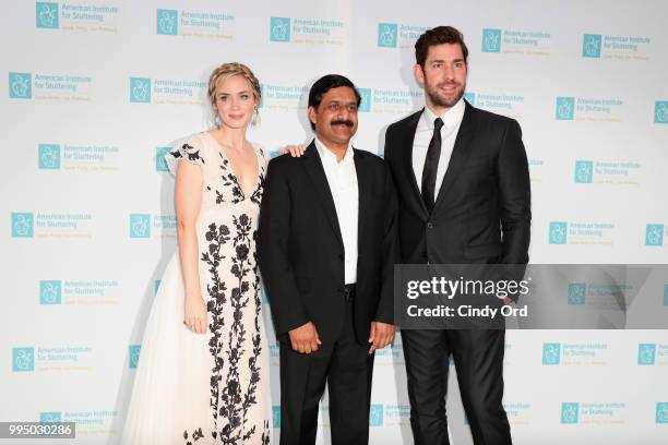 Actor and AIS Gala host Emily Blunt, Freeing Voices Changing Lives Award recipient Ziauddin Yousafzai, and actor John Krasinski attend the American...