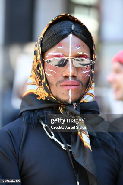 Guest attends July 2018 Men's Fashion week outside of the Cadillac House on July 9, 2018 in New York City.