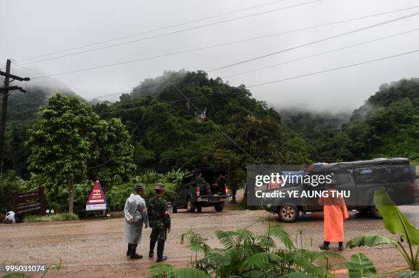 Thai soldiers arrive at the Tham Luang cave area as rescue operations continue for those still trapped inside the cave in Khun Nam Nang Non Forest...