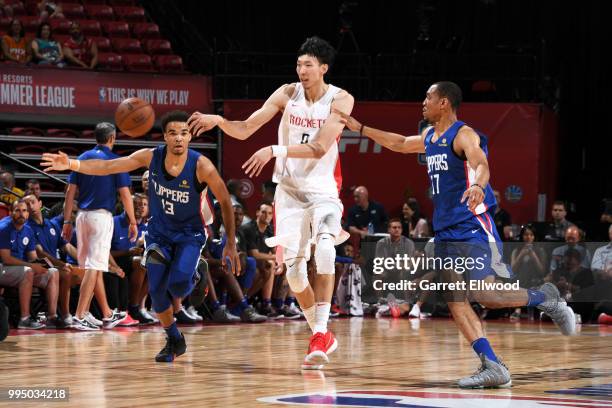 Zhou Qi of the Houston Rockets passes the ball against the LA Clippers during the 2018 Las Vegas Summer League on July 9, 2018 at the Thomas & Mack...