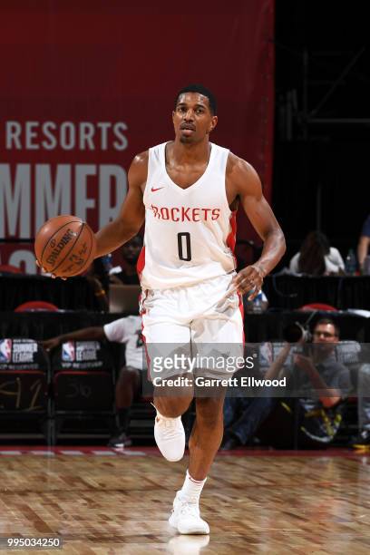 De'Anthony Melton of the Houston Rockets moves up the court against the LA Clippers during the 2018 Las Vegas Summer League on July 9, 2018 at the...