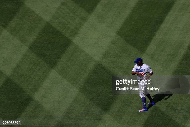 Yasiel Puig of the Los Angeles Dodgers looks on prior to a game against the Los Angeles Angels of Anaheim at Angel Stadium on July 7, 2018 in...