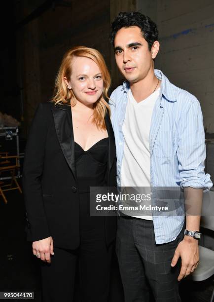 Elisabeth Moss and Max Minghella attend "The Handmaid's Tale" Hulu finale at The Wilshire Ebell Theatre on July 9, 2018 in Los Angeles, California.