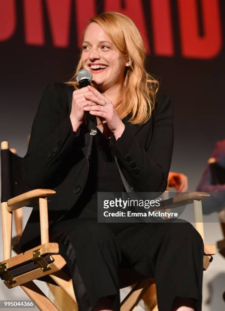Elisabeth Moss speaks onstage during "The Handmaid's Tale" Hulu finale at The Wilshire Ebell Theatre on July 9, 2018 in Los Angeles, California.