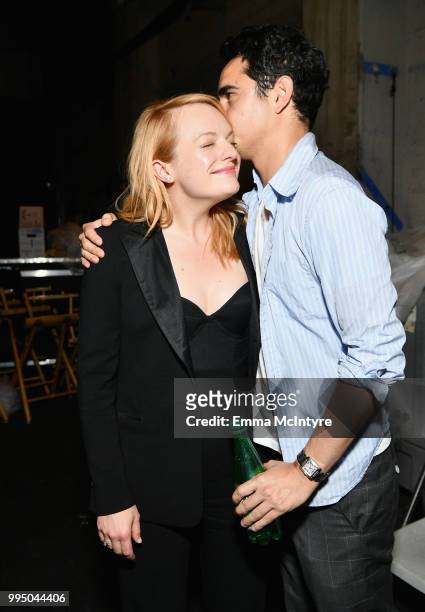Elisabeth Moss and Max Minghella attend "The Handmaid's Tale" Hulu finale at The Wilshire Ebell Theatre on July 9, 2018 in Los Angeles, California.