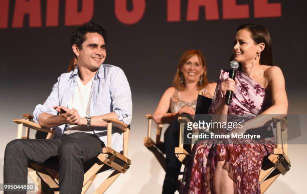 Max Minghella and Alexis Bledel speak onstage during "The Handmaid's Tale" Hulu finale at The Wilshire Ebell Theatre on July 9, 2018 in Los Angeles,...