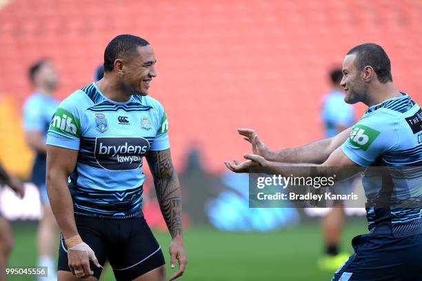 Tyson Frizell and Boyd Cordner share a laugh during the New South Wales Blues State of Origin Captain's Run at Suncorp Stadium on July 10, 2018 in...