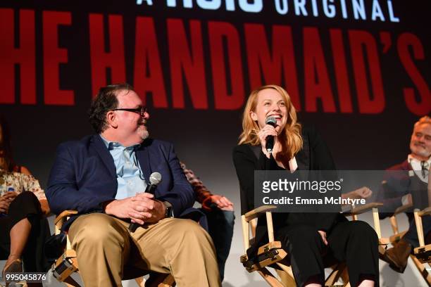 Bruce Miller and Elisabeth Moss speak onstage during "The Handmaid's Tale" Hulu finale at The Wilshire Ebell Theatre on July 9, 2018 in Los Angeles,...