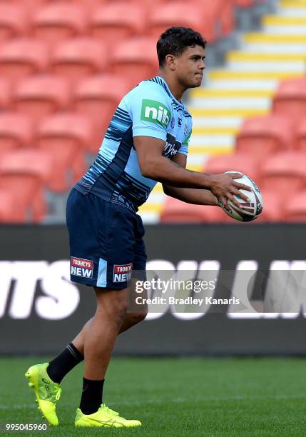 Latrell Mitchell kicks the ball during the New South Wales Blues State of Origin Captain's Run at Suncorp Stadium on July 10, 2018 in Brisbane,...