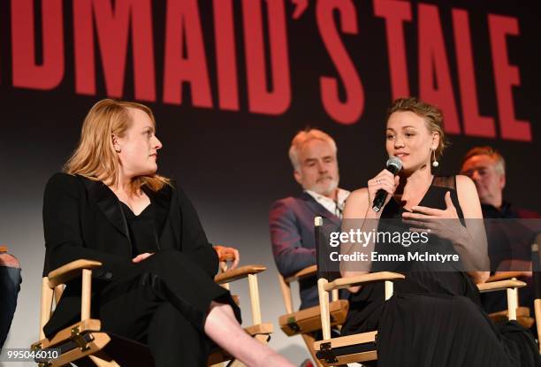 Elisabeth Moss and Yvonne Strahovski speak onstage during "The Handmaid's Tale" Hulu finale at The Wilshire Ebell Theatre on July 9, 2018 in Los...