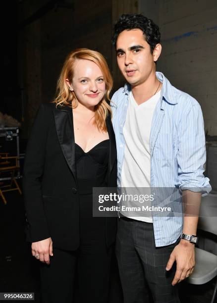 Elisabeth Moss and Max Minghella attend "The Handmaid's Tale" Hulu finale at The Wilshire Ebell Theatre on July 9, 2018 in Los Angeles, California.