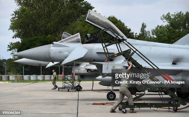 Pilot sits in a Typhoon aircraft at Mihail Kogalniceanu air base in Constanta, Romania, where the RAF are playing a leading role in NATO's enhanced...