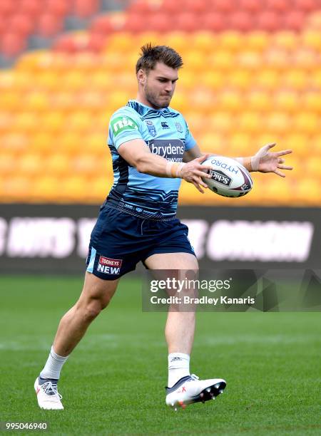 Angus Crichton kicks the ball during the New South Wales Blues State of Origin Captain's Run at Suncorp Stadium on July 10, 2018 in Brisbane,...