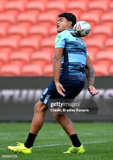 Latrell Mitchell attempts to catch the ball during the New South Wales Blues State of Origin Captain's Run at Suncorp Stadium on July 10, 2018 in...