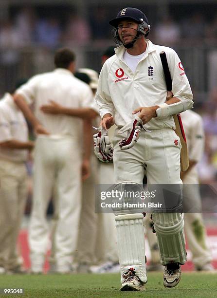 Michael Atherton of England leaves the field after being dismissed for nine, during day four of the Fifth Test between England and Australia, at The...