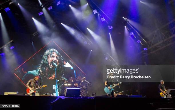 Chris Shiflett, Taylor Hawkins, Dave Grohl and Pat Smear of Foo Fighters perform at the Festival d'été de Québec on July 9, 2018 in Queandec City,...