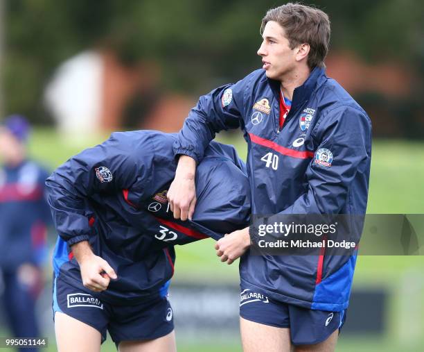 Nathan Mullenger-McHugh of Footscray plays with Kieran Collins of the Bulldogs during a Western Bulldogs AFL media opportunity at Whitten Oval on...