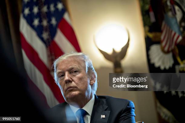 President Donald Trump listens during a meeting with bipartisan members of Congress on immigration in the Cabinet Room of the White House in...