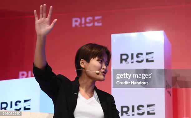 In this handout image provided by RISE, Tan Hooi Ling Co-Founder of Grab speaks on centre stage during day one of RISE 2018 at Hong Kong Convention...