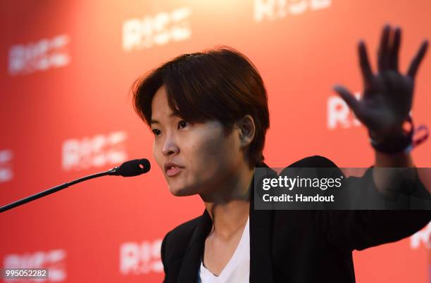 In this handout image provided by RISE, Tan Hooi Ling Co-Founder of Grab speaks at a press conference during day one of RISE 2018 at Hong Kong...