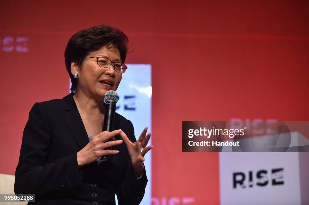 In this handout image provided by RISE, Carrie Lam, Chief Executive of Hong Kong Government speaks on centre stage during day one of RISE 2018 at...