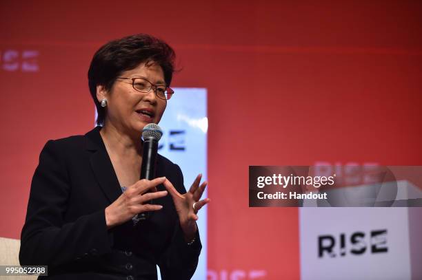 In this handout image provided by RISE, Carrie Lam, Chief Executive of Hong Kong Government speaks on centre stage during day one of RISE 2018 at...