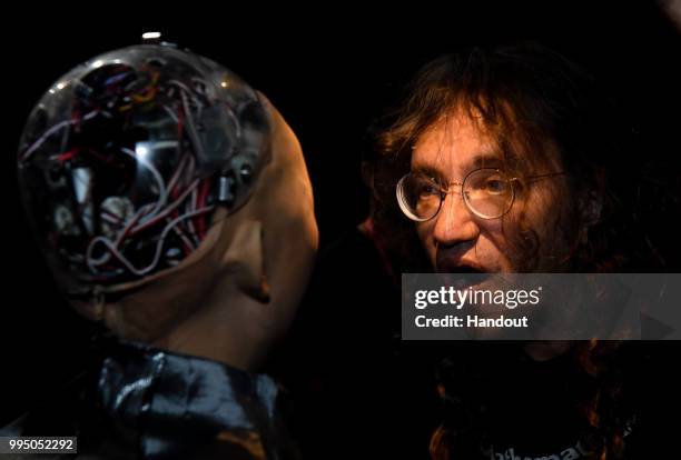 In this handout image provided by RISE, Sophia The Robot from Hanson Robotics is tested back stage by Ben Goertzelm Chief Scientist, Hanson Robotics...