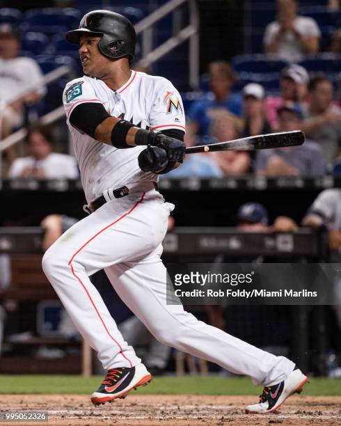Starlin Castro of the Miami Marlins at bat during the game against the Milwaukee Brewers at Marlins Park on July 9, 2018 in Miami, Florida.