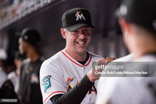 Brad Ziegler of the Miami Marlins celebrates in the dugout during the game against the Milwaukee Brewers at Marlins Park on July 9, 2018 in Miami,...