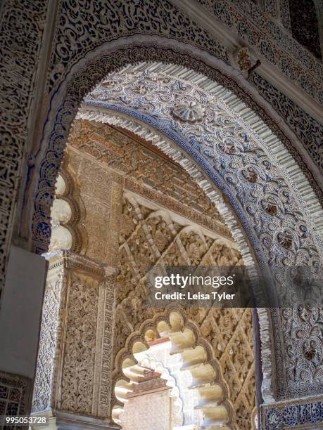 Intricate Islamic stalactite work in the Palacio de Don Pedro at the Alcazar of Seville, a royal palace built on the grounds of a Abbadid Muslim...