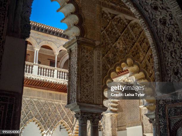 Plaster work in the Palacio de Don Pedro at the Alcazar of Seville, a royal palace built on the grounds of a Abbadid Muslim fortress, Seville, Spain.