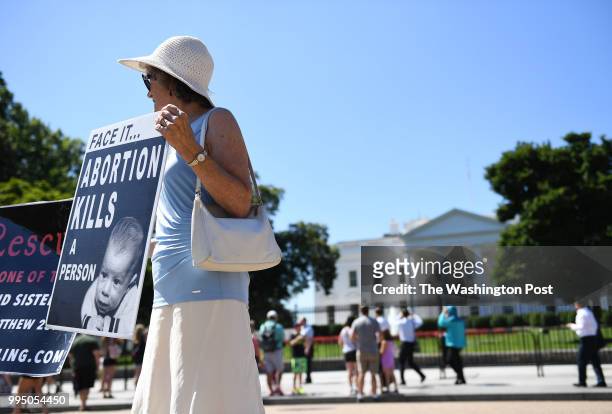 Cathy Roth of Germantown, MD protests with other pro-life supporters outside of the White House on Monday July 09, 2018 in Washington, DC. President...