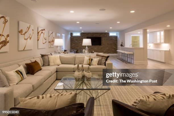Living area and Wet Bar in the Basement of the Travers model home at Summerhouse Landing on July 6, 2018 in Herndon Virginia.
