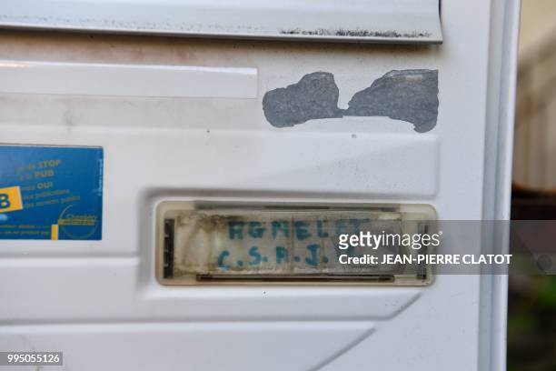 Picture taken on July 10, 2018 in Chambery shows the letterbox of the house of Maurice Agnelet which will be auctioned at the Courthouse. - Maurice...
