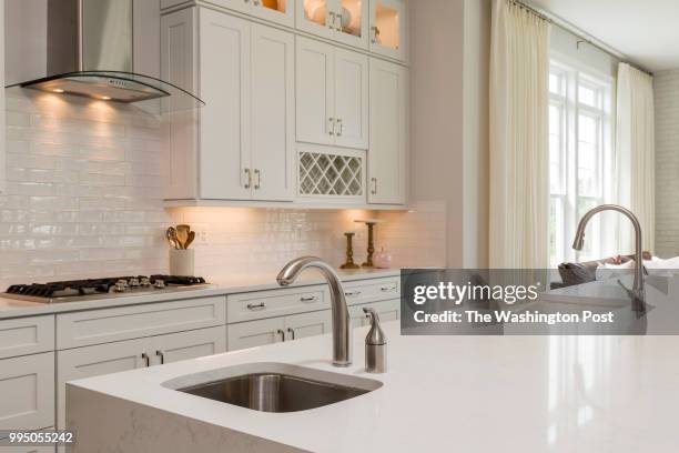 Two Kitchen sinks in the Travers model home at Summerhouse Landing on July 6, 2018 in Herndon Virginia.