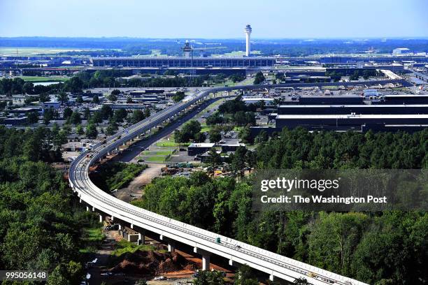 Construction on metro tracks between the Dulles Airport stop and the Loudoun Gateway station, part of Metro's Phase II along the Silver Line, is...