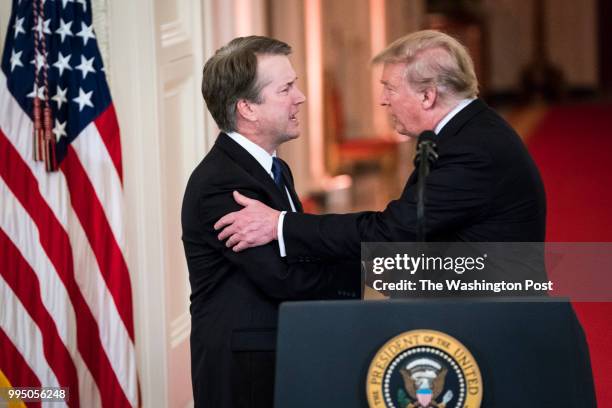 President Donald J. Trump greets Judge Brett M. Kavanaugh of the District of Columbia Circuit, during an announcement ceremony for the nominee of...