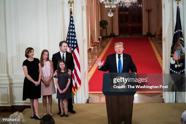 Judge Brett M. Kavanaugh of the District of Columbia Circuit, and his family listen as President Donald J. Trump speaks during an announcement...