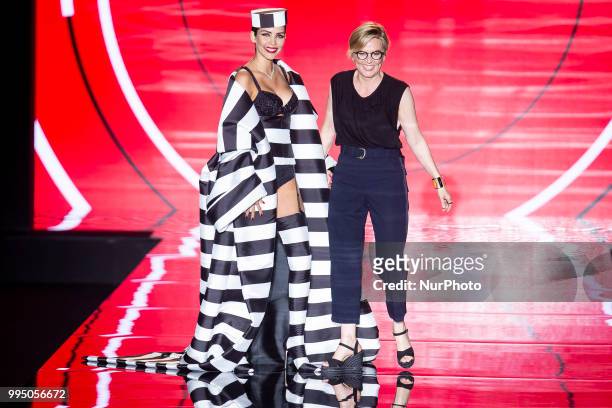 Model Rosanna Zanetti and Designer Nuria Sarda walks the runway at the 'Andres Sarda' catwalk during the Mercedes-Benz Madrid Fashion Week...