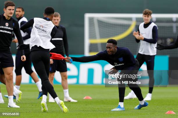 Danny Welbeck of England national team plays with toy rooster during an England training session ahead of the 2018 FIFA World Cup Russia Semi-Final...