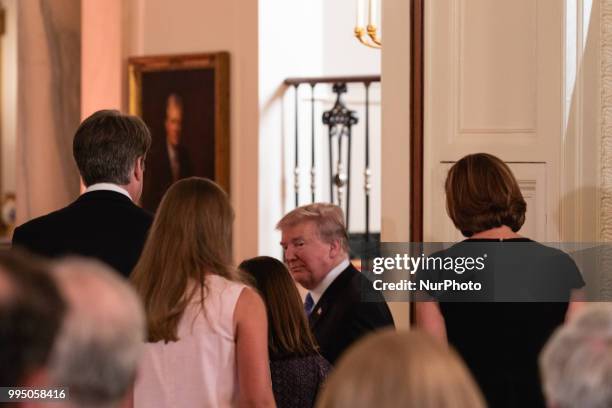 President Donald Trump leaves the East Room after introducing Judge Brett M. Kavanaugh of the U.S. Court of Appeals for the District of Columbia...