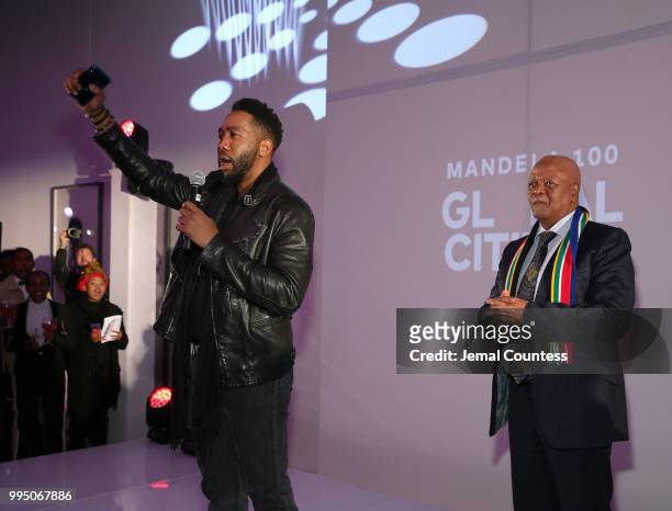 Ndaba Mandela and Minister of Energy for South Africa Jeff Radebe onstage during the Global Citizen Festival: Mandela 100 Launch Event at the Circa...