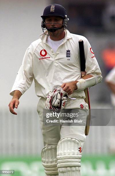 Michael Atherton of England leaves the ground after being dismissed for nine, during day four of the Fifth Test between England and Australia, at The...