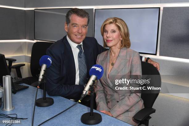 Pierce Brosnan and Christine Baranski visit Magic Radio on July 10, 2018 in London, England.