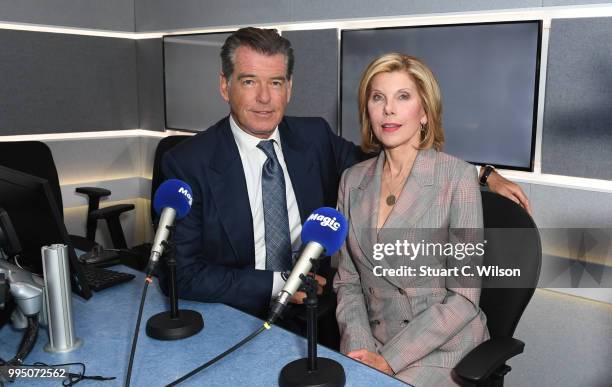 Pierce Brosnan and Christine Baranski visit Magic Radio on July 10, 2018 in London, England.