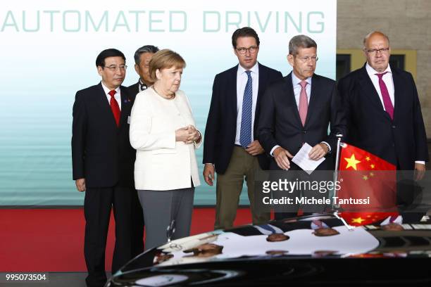 German Chancellor Angela Merkel , Minister of Traffic and Infrastructures Andreas Scheuer,Bernhard Mattes VDA President and Peter Altmaier, Minister...